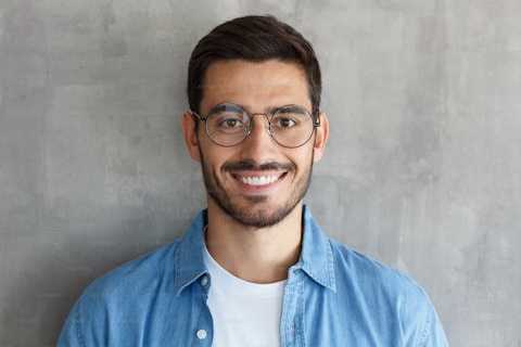 Smiling customer with glasses